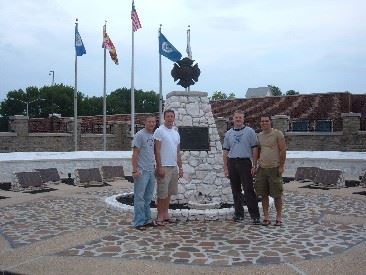 People in front of a firefighters' memorial